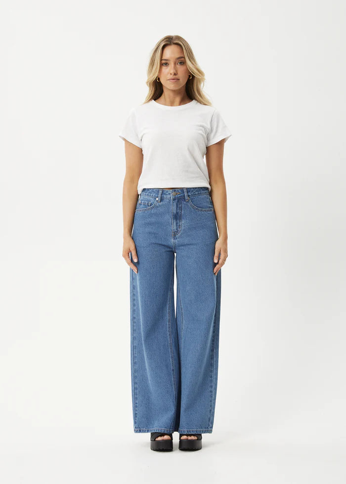 Gigi Flared Jeans in Worn Blue